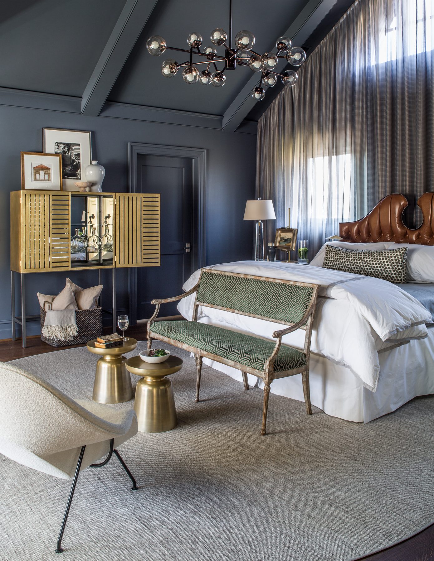 Tailored study and suite with lacquered walls, tobacco leather, and brass — DC Design House by Christopher Patrick Interiors