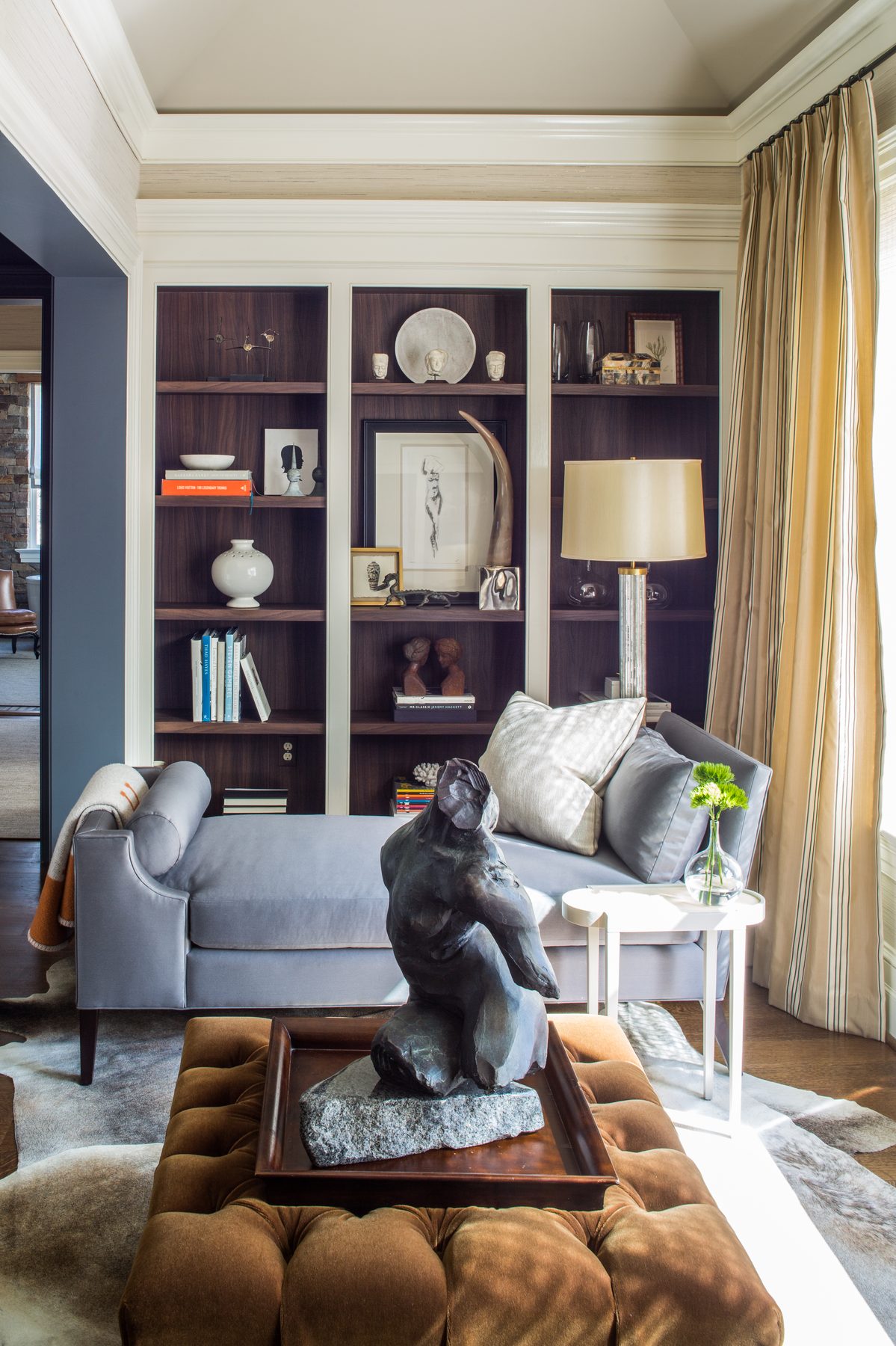 Tailored study and suite with lacquered walls, tobacco leather, and brass — DC Design House by Christopher Patrick Interiors